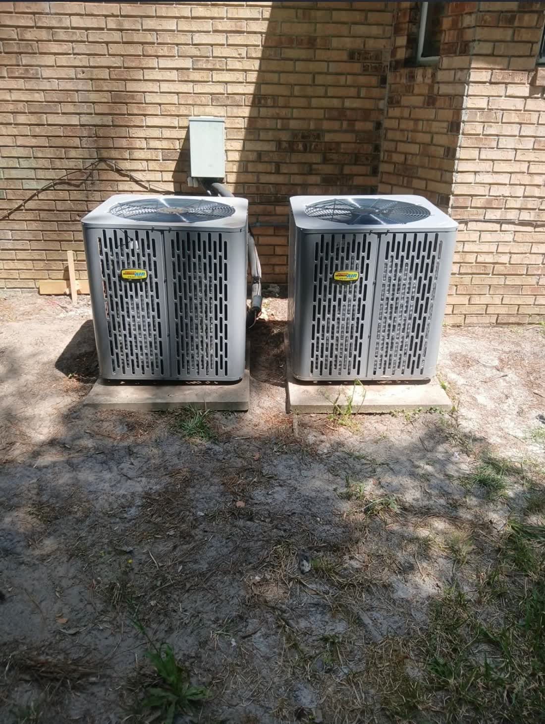 Two Sweet Georgia-installed condensing units serving a multi-unit brick building in Statesboro